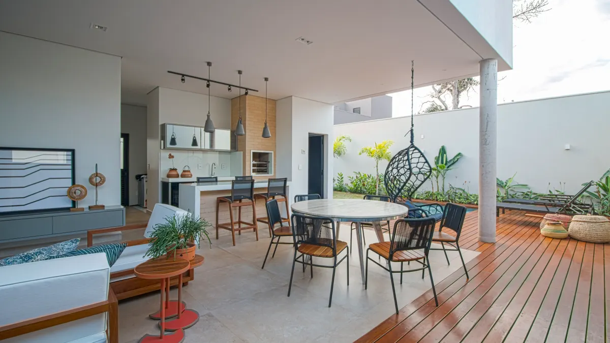 Modern patio with outdoor dining and kitchen area